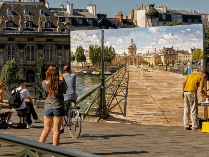 The Arts Bridge - in Paris in September dressed in a summer
