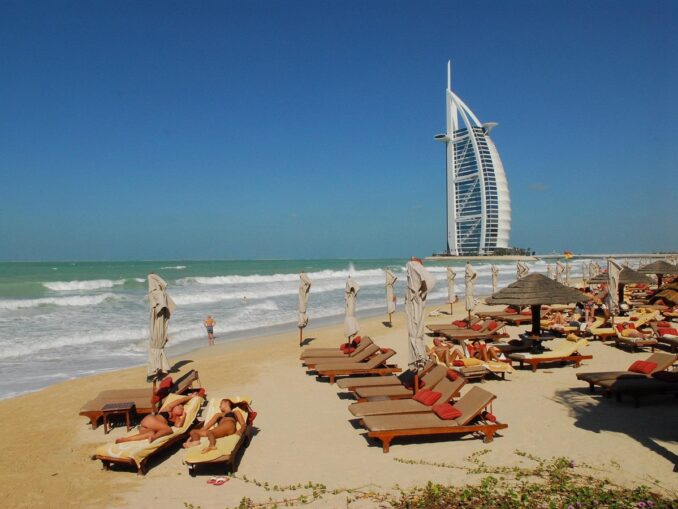 On the beach - in Dubai in July it is very hot
