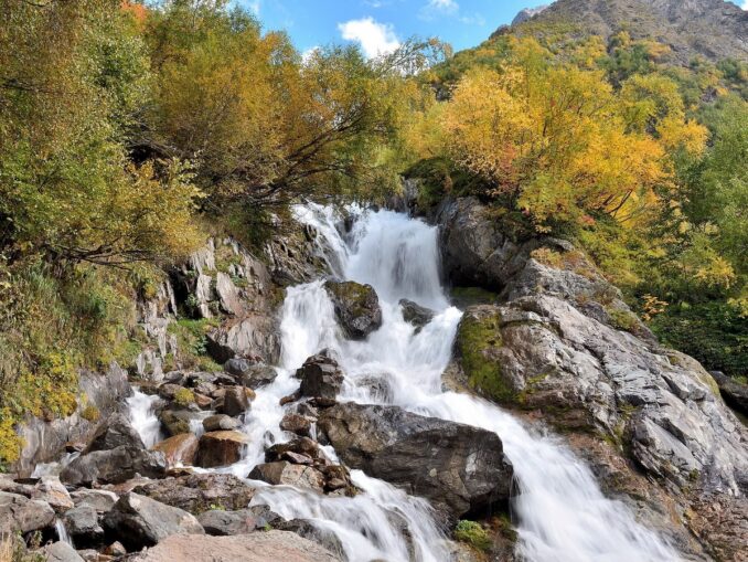 Waterfall in Dombay in the fall