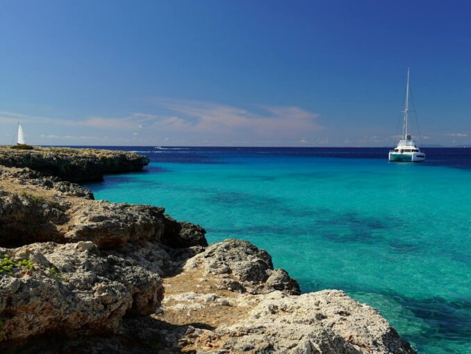 Sea and catamaran - the air temperature in Cyprus in April reaches +25 degrees Celsius