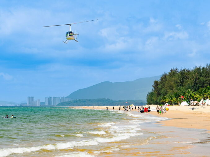 Beach - the sea in Hainan in May warms up to +30 degrees Celsius